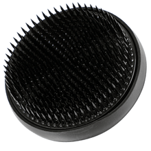 Load image into Gallery viewer, close up of the round black kenzan in oblique position