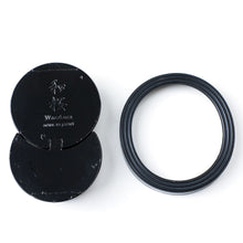 Load image into Gallery viewer, Bakc of the Sun and Moon black kenzan next to rubber gasket