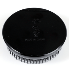 Load image into Gallery viewer, Black roudn kenzan base with Wazakura logo
