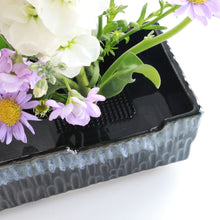 Load image into Gallery viewer, close up on floral composition with the black kenzan
