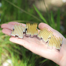 Load image into Gallery viewer, hand holding the 4 mini interlock kenzans
